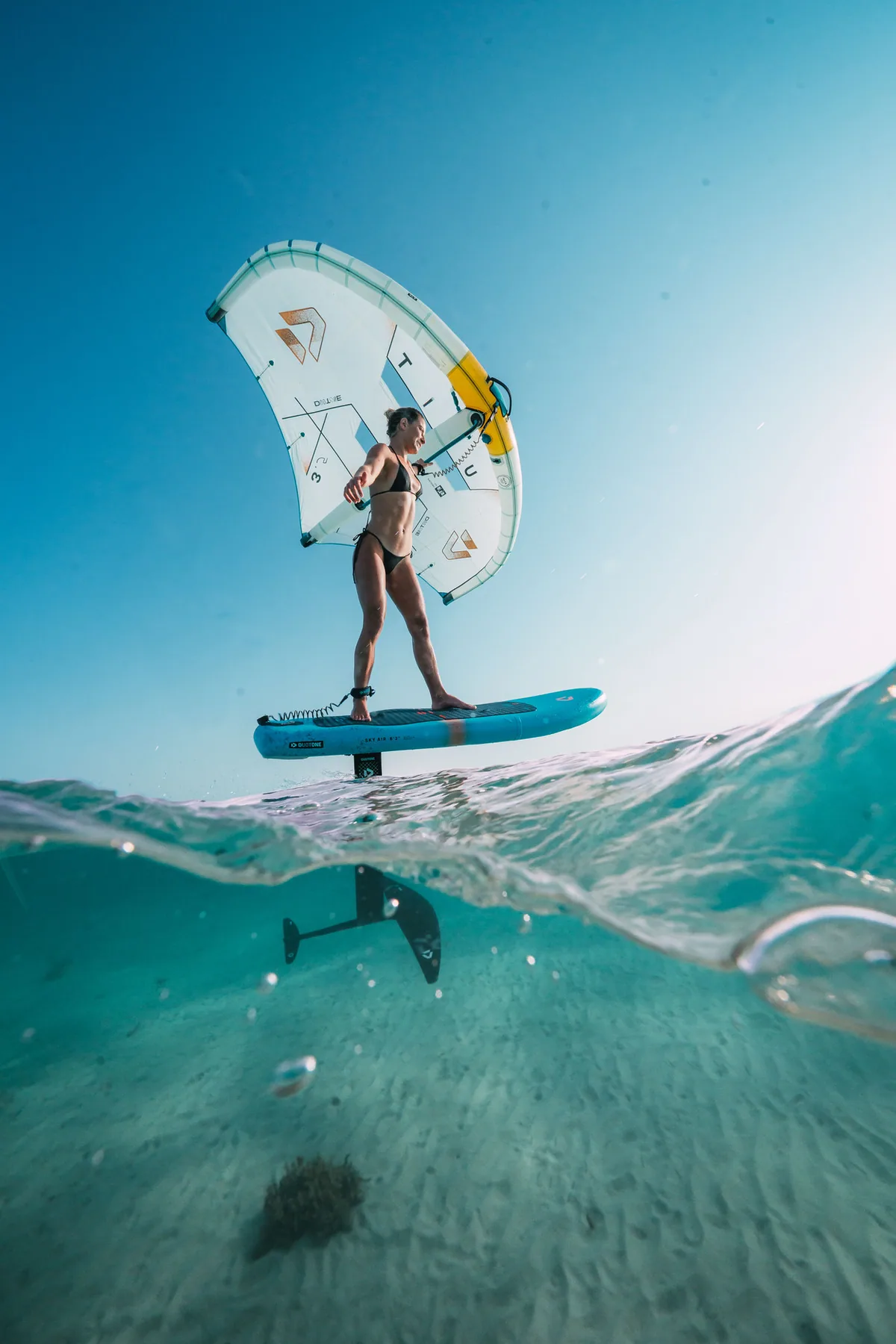 Foiling over clear water