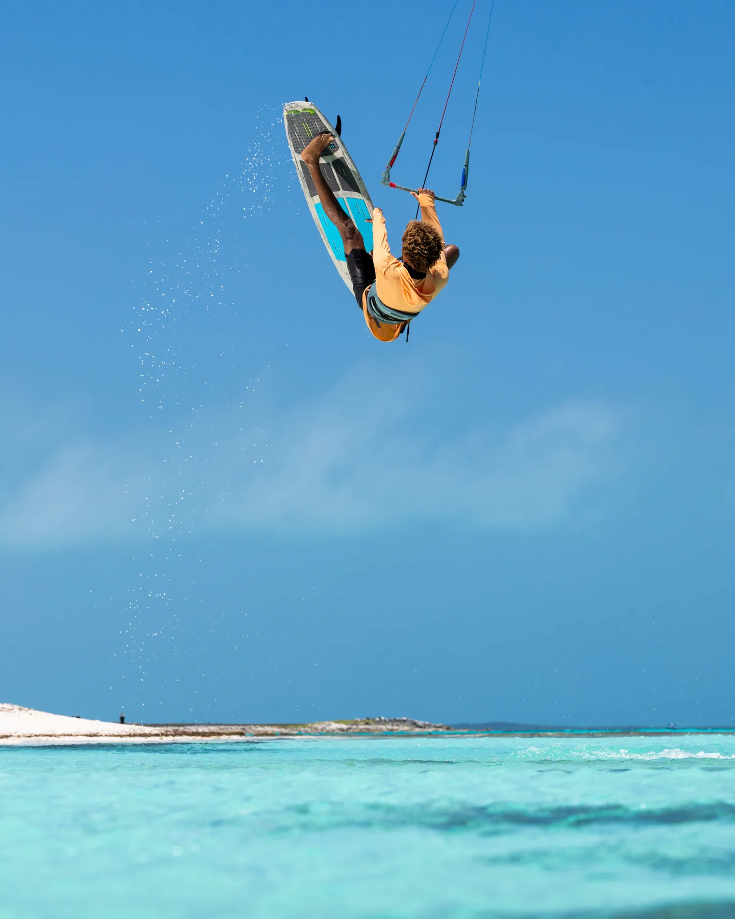 Kitesurfer riding at sunset
